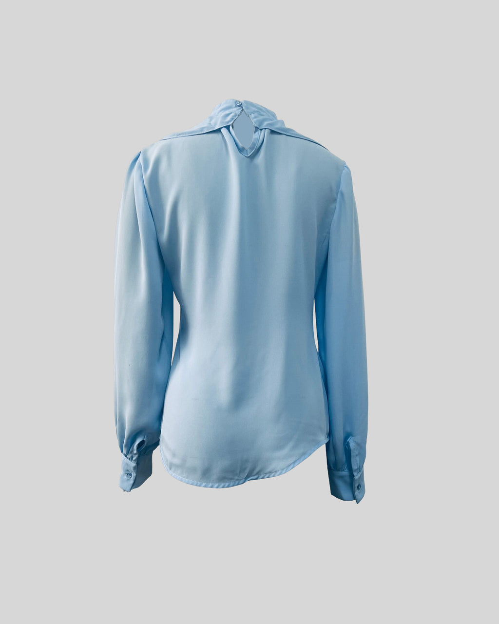B012 - Puff-sleeve blouse with overlay detail