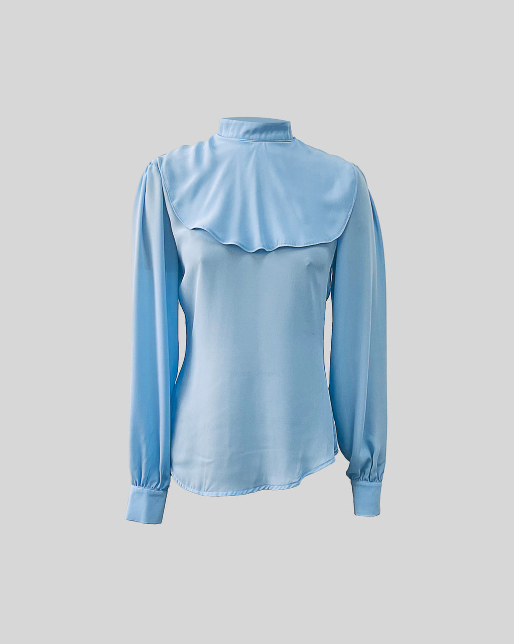 B012 - Puff-sleeve blouse with overlay detail